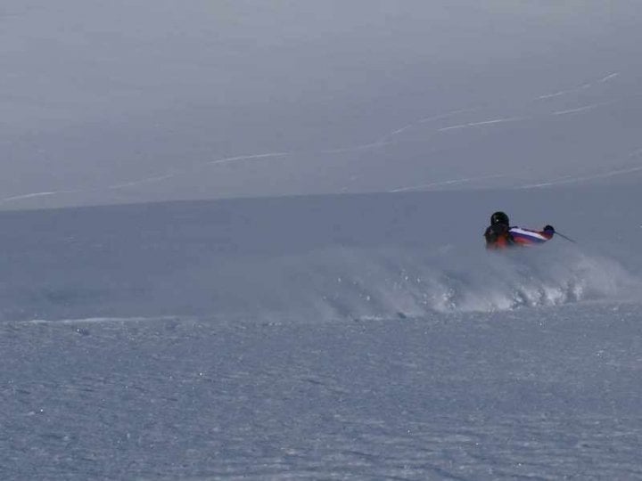 Caucasus mountains covered in fresh powder snow with dramatic sky